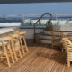 ENDEMIC Sun Deck bar and tables at dawn
