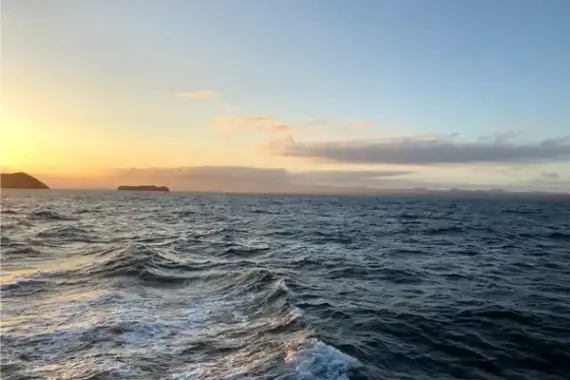 WOLF ISLANDS CRUISE GALAPAGOS-ISLANDS-AT-DUSK-OCEAN-